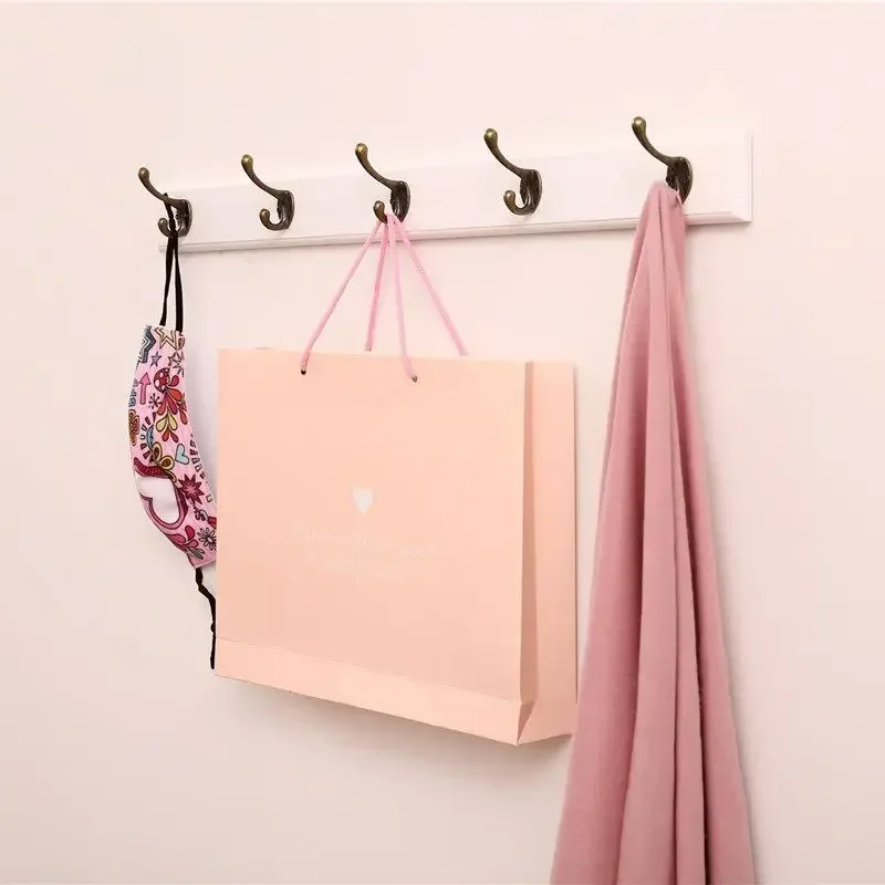 porte-manteau mural en bois massif avec crochets et cintres décoratifs - Image 4