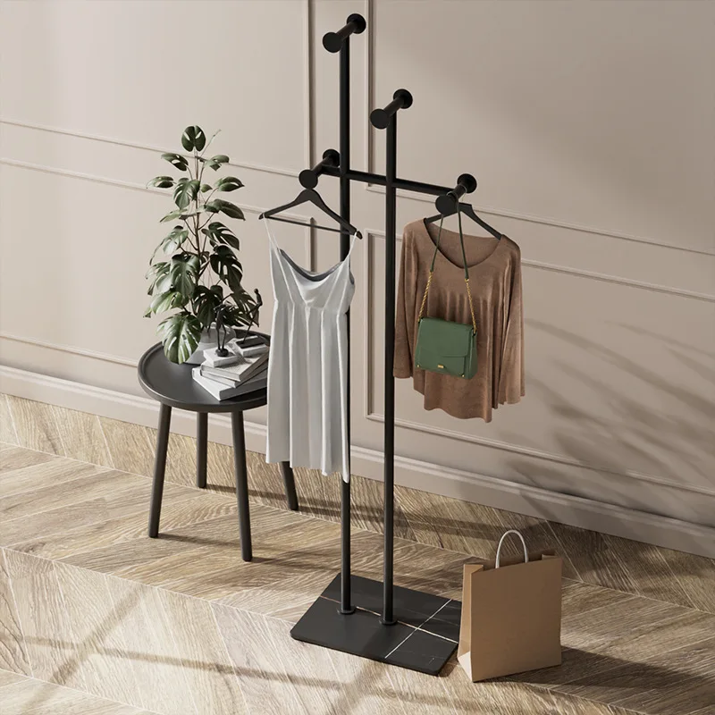 porte-vĂȘtements en fer forgĂ© pour une dĂ©coration Ă©lĂ©gante et moderne